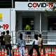 People waiting to get tested for covid-19 at a testing site in Miami, Florida